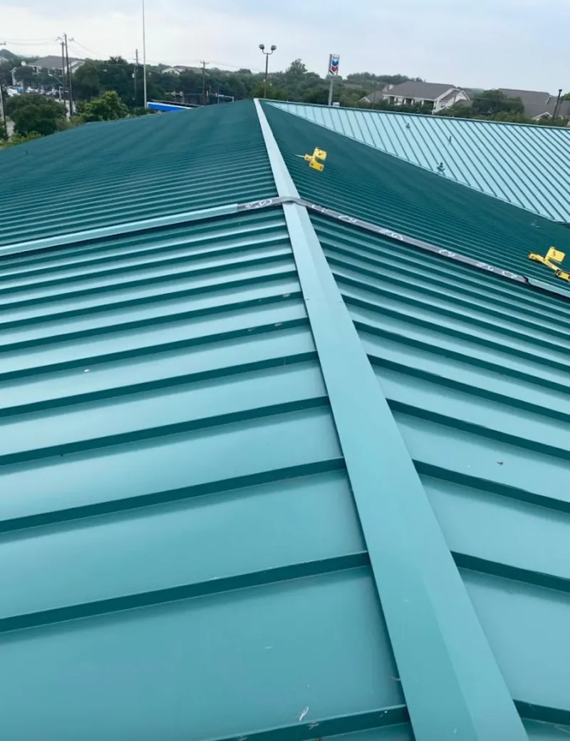 Green commercial metal roof ridge and valley for Metal Roof Repair in Highland Springs